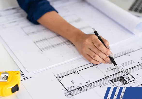 engeneer-reviewing-demolition-plan Asbestos Challenges in Philadelphia Commercial Projects